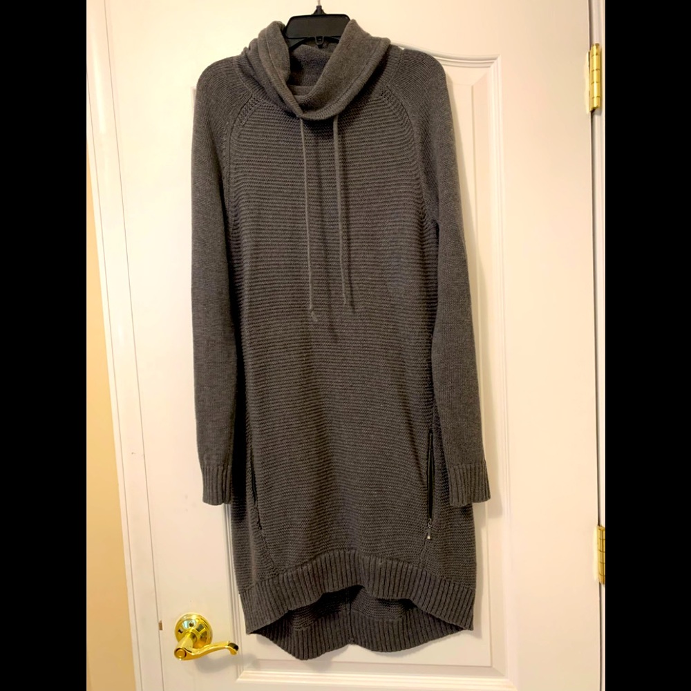 Long sweater. Could be worn with leggings or as a dress.